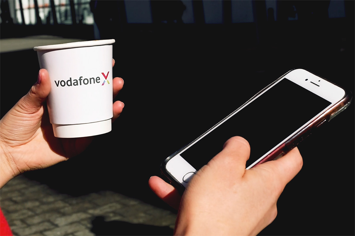 Coffee cup and phone